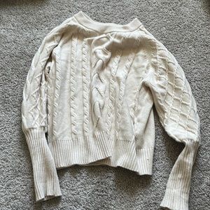Beige knit sweater with cute design